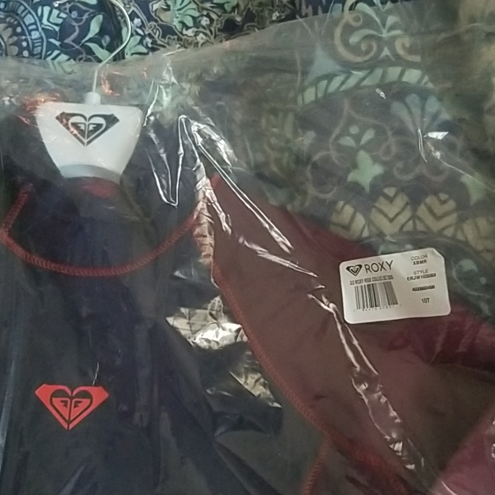 Brand new, never opened Roxy wetsuit Size 10 Tall